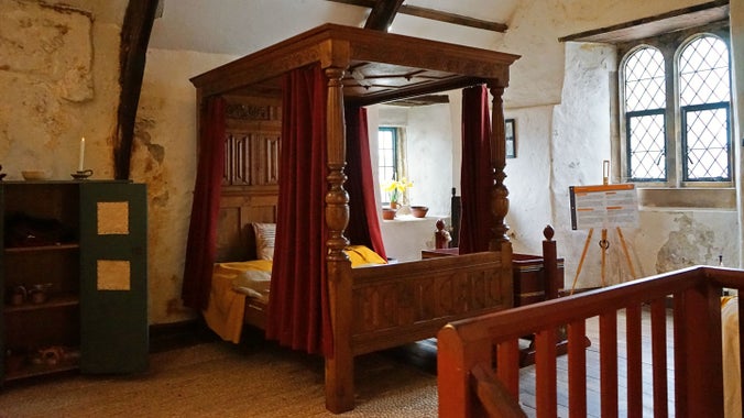 Visit the master bedroom in the Tudor Merchant's House, Tenby